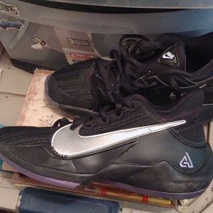 Black and purple Nikes size 4.5Y